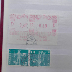 Lot de timbres de Suisse oblitérés en deux albums.