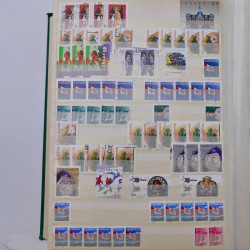 Lot de timbres de Canada neufs et oblitérés en un album