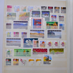 Lot de timbres de Canada neufs et oblitérés en un album
