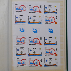 Lot de timbres de Canada neufs et oblitérés en un album