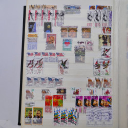 Lot de timbres d'Etats-Unis oblitérés en un deux albums.