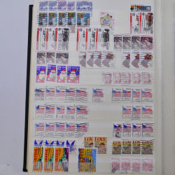 Lot de timbres d'Etats-Unis oblitérés en un deux albums.