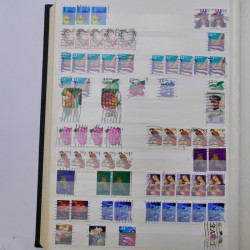 Lot de timbres d'Etats-Unis oblitérés en un deux albums.