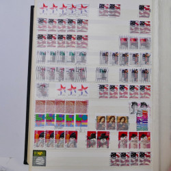 Lot de timbres d'Etats-Unis oblitérés en un deux albums.