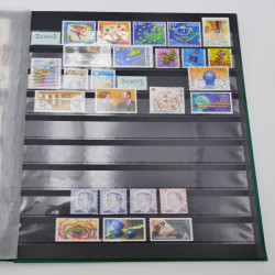 Lot de timbres de Liechtenstein et Luxembourg neufs et oblitérés en un album.