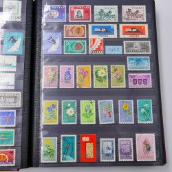 Lot de timbres de Pologne 1915-2003 neufs et oblitérés en un album.