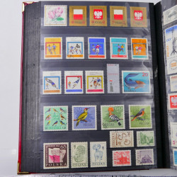Lot de timbres de Pologne 1915-2003 neufs et oblitérés en un album.