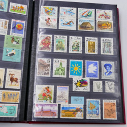 Lot de timbres de Pologne 1915-2003 neufs et oblitérés en un album.