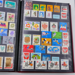 Lot de timbres de Pologne 1915-2003 neufs et oblitérés en un album.