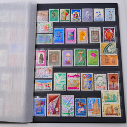 Lot de timbres de Tunisie neufs et oblitérés en un album.