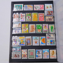 Lot de timbres de Tunisie neufs et oblitérés en un album.