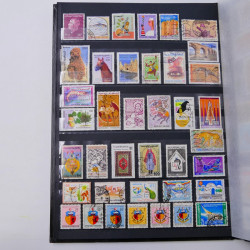Lot de timbres de Tunisie neufs et oblitérés en un album.