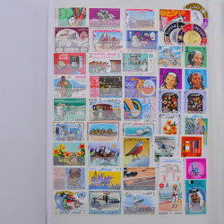 Lot de timbres d'Arabie neufs et oblitérés en un album.