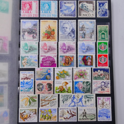 Lot de timbres de Monaco - Finlande neufs et oblitérés en un album.