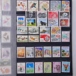 Lot de timbres de Monaco - Finlande neufs et oblitérés en un album.