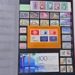 Lot de timbres de Monaco - Finlande neufs et oblitérés en un album.