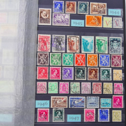 Lot de timbres de Belgique neufs et oblitérés en un album.