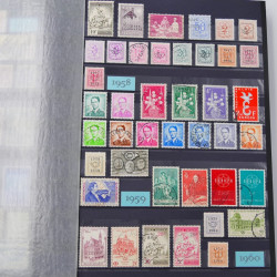 Lot de timbres de Belgique neufs et oblitérés en un album.