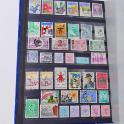 Lot de timbres de Belgique neufs et oblitérés en un album.