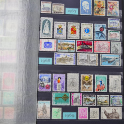 Lot de timbres de Belgique neufs et oblitérés en un album.