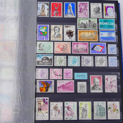 Lot de timbres de Belgique neufs et oblitérés en un album.
