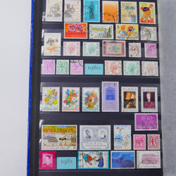 Lot de timbres de Belgique neufs et oblitérés en un album.