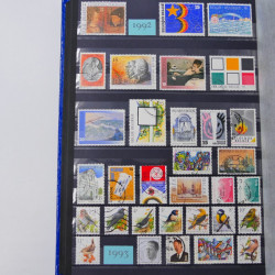 Lot de timbres de Belgique neufs et oblitérés en un album.