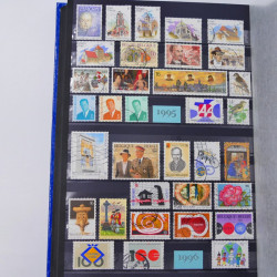 Lot de timbres de Belgique neufs et oblitérés en un album.