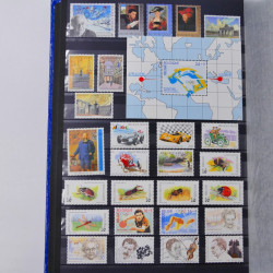 Lot de timbres de Belgique neufs et oblitérés en un album.