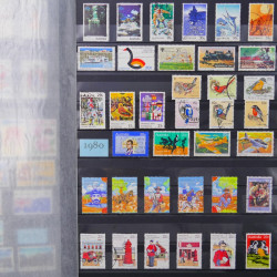 Lot de timbres d'Australie 1912-2003 neufs et oblitérés en un album.