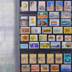 Lot de timbres d'Australie 1912-2003 neufs et oblitérés en un album.