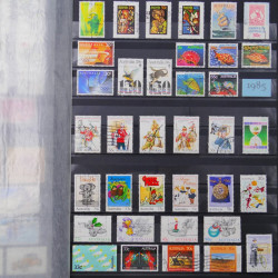 Lot de timbres d'Australie 1912-2003 neufs et oblitérés en un album.