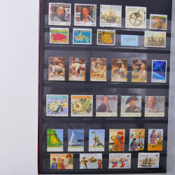 Lot de timbres d'Australie 1912-2003 neufs et oblitérés en un album.