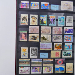 Lot de timbres d'Australie 1912-2003 neufs et oblitérés en un album.