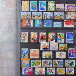 Lot de timbres d'Australie 1912-2003 neufs et oblitérés en un album.