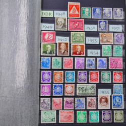 Lot de timbres d'Allemagne DDR 1948-1990 neufs et oblitérés en un album.