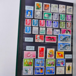 Lot de timbres d'Allemagne DDR 1948-1990 neufs et oblitérés en un album.