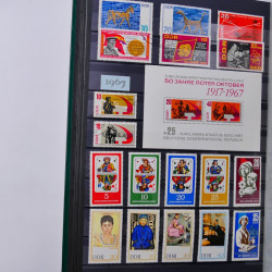 Lot de timbres d'Allemagne DDR 1948-1990 neufs et oblitérés en un album.
