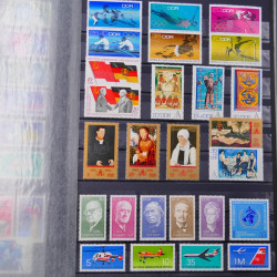 Lot de timbres d'Allemagne DDR 1948-1990 neufs et oblitérés en un album.