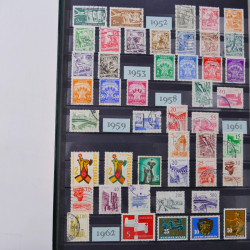 Lot de timbres d'Espagne - Yougoslavie neufs et oblitérés en un album.
