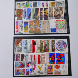 Vrac philatélique de timbres du monde neufs et oblitérés en un carton.