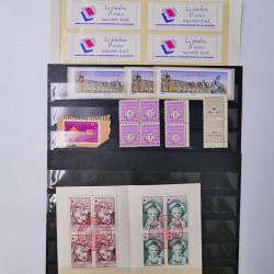 Vrac philatélique de timbres du monde neufs et oblitérés en un carton.