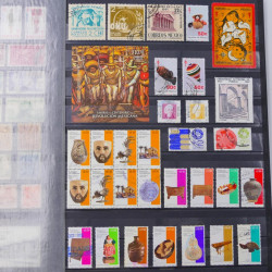 Lot de timbres de Mexique neufs et oblitérés en un album.