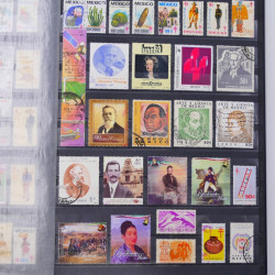 Lot de timbres de Mexique neufs et oblitérés en un album.