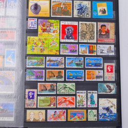 Lot de timbres de Mexique neufs et oblitérés en un album.