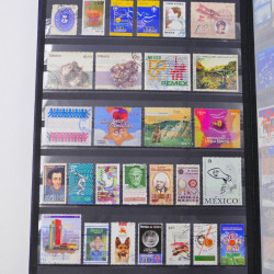 Lot de timbres de Mexique neufs et oblitérés en un album.