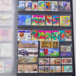 Lot de timbres de Mexique neufs et oblitérés en un album.