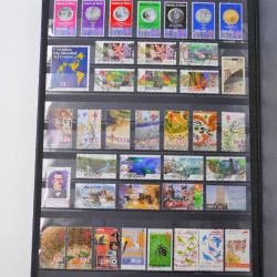 Lot de timbres de Mexique neufs et oblitérés en un album.