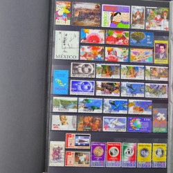 Lot de timbres de Mexique neufs et oblitérés en un album.