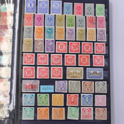 Lot de timbres d'Autriche, Pays Bas, Portugal en un album.